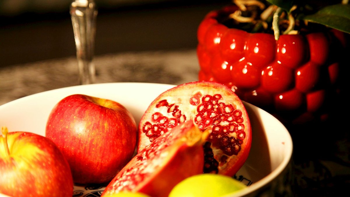 watering pomegranate pot